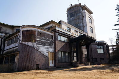 Exterior of old building against clear sky