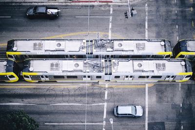 High angle view of vehicles on road in city
