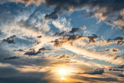 Low angle view of clouds in sky during sunset