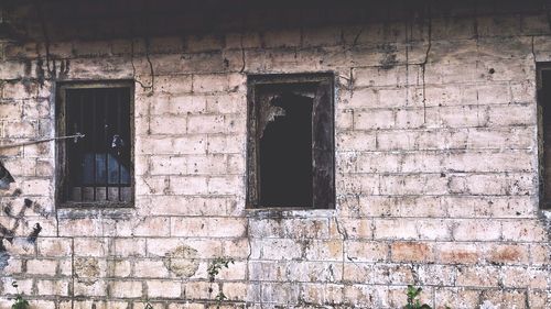 Close-up of window on abandoned building