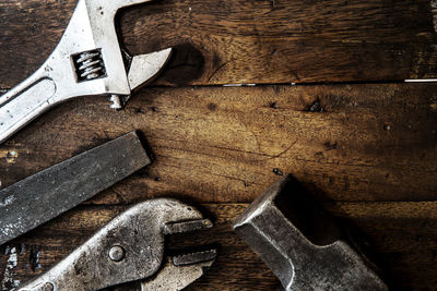 Directly above shot of work tools on table at workshop