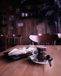 Empty chairs and tables in cafe