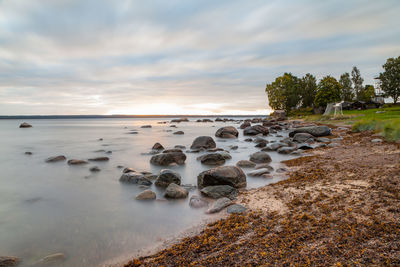 Scenic view of sea against sky at sunset