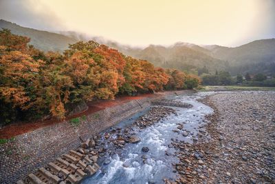 Scenic view of mountains against sky during autumn