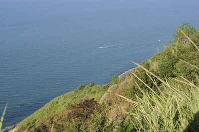 High angle view of sea shore against sky