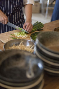 Midsection of man preparing food