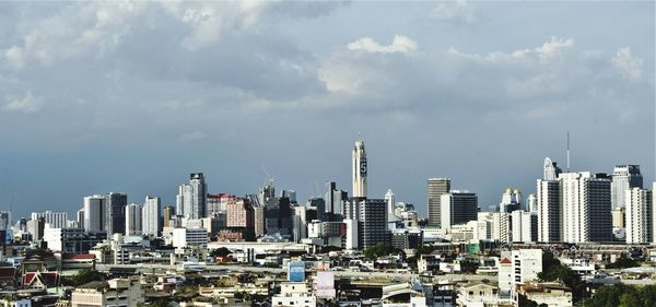 Modern buildings in city against sky