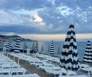 Panoramic view of sea and buildings against sky