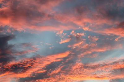 Low angle view of dramatic sky during sunset