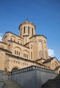 Low angle view of building against blue sky