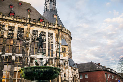 Low angle view of historic building against sky