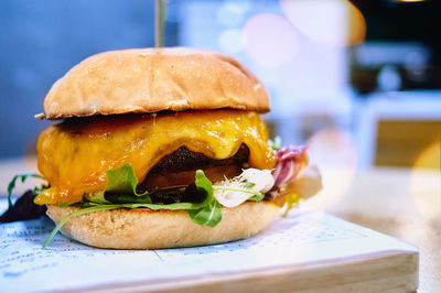 Close-up of burger on table