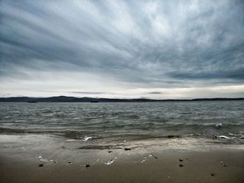 Scenic view of beach against sky