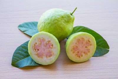 High angle view of fruits on cutting board