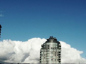 Low angle view of building against blue sky