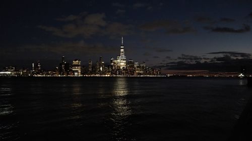 Illuminated buildings in city at night