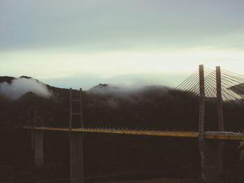 Scenic view of mountains in foggy weather