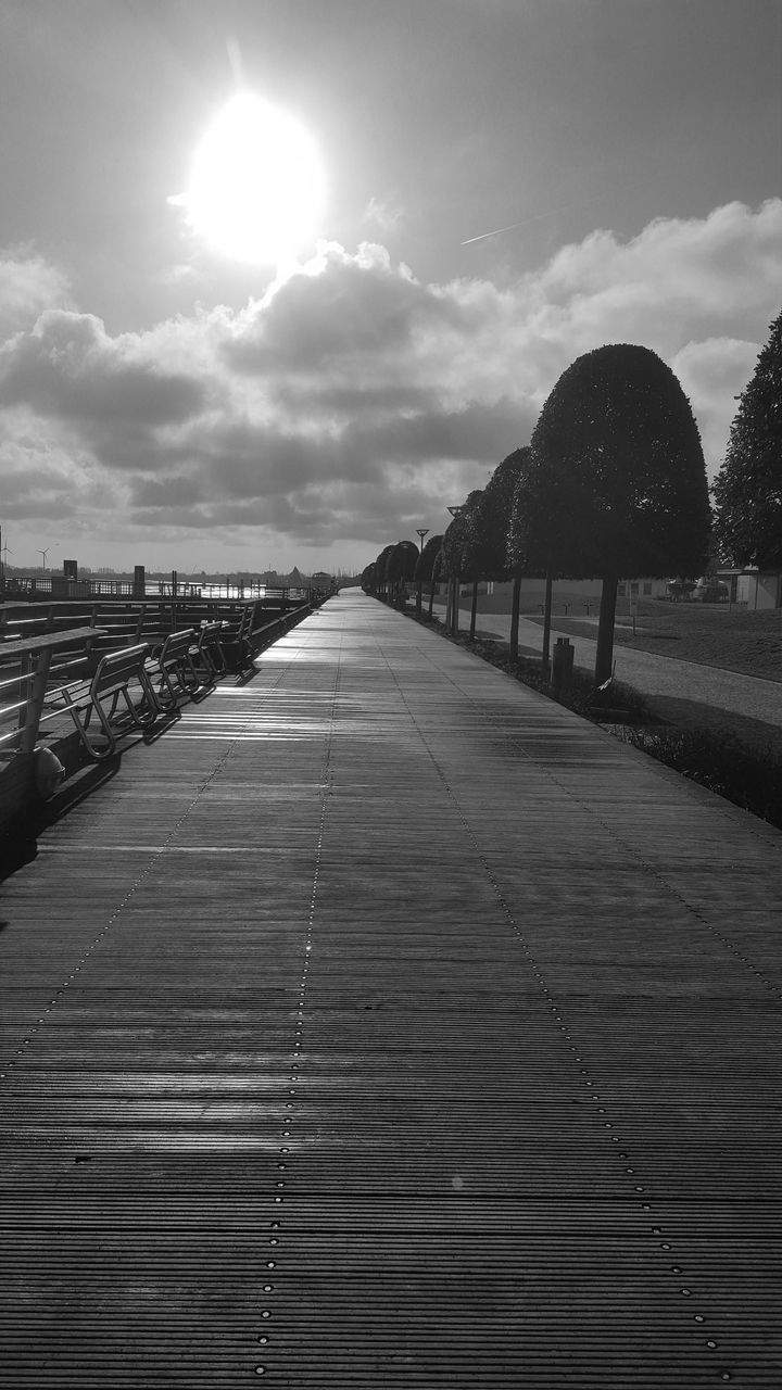 SURFACE LEVEL OF EMPTY FOOTPATH BY RAILING