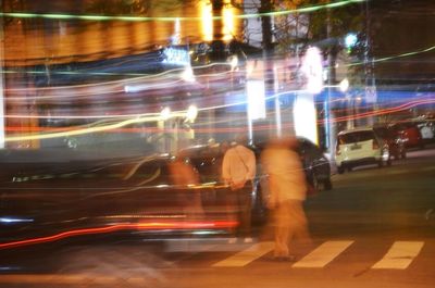 Blurred motion of people at night