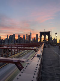 View of city buildings at sunset