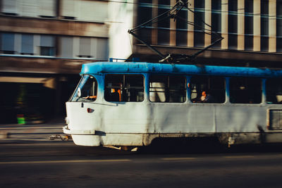 Train on railroad track in city