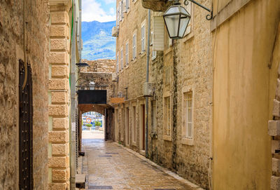 Alley amidst buildings in city