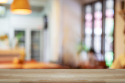 Defocused image of empty chairs in restaurant