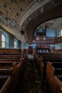 Empty benches in building