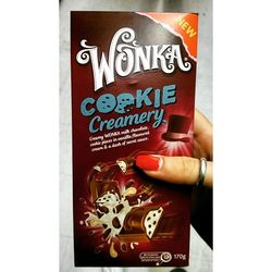 Close-up of hand holding text