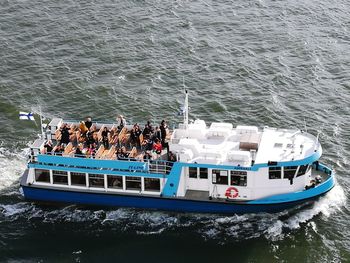 High angle view of people on boat in sea