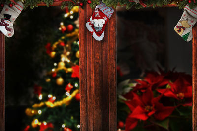 Close-up of christmas decorations hanging on tree