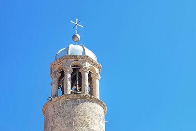 Low angle view of church against blue sky