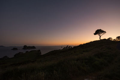 Scenic view of sea against sky at sunset