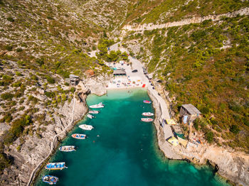 Aerial view of sea and landscape against sky