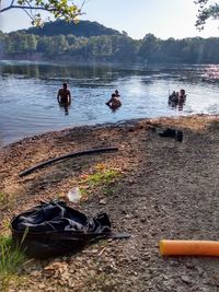 People relaxing on beach