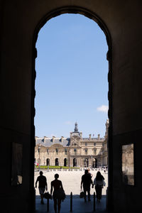 People at historical building