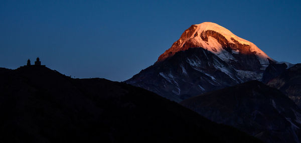 Scenic view of mountains against clear sky