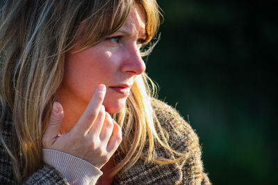 Close-up portrait of a teenage girl in winter