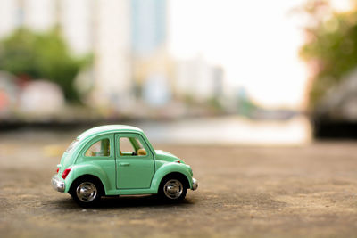 Close-up of toy car on road