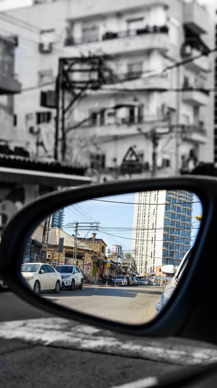 VIEW OF CITY STREET SEEN THROUGH GLASS