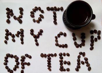 High angle view of coffee beans on table