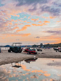 Scenic view of beach against sky during sunset