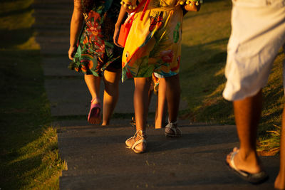 People are seen going down the stairs of cristo da barra in the city of salvador, bahia.