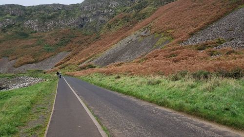 Road leading towards mountain