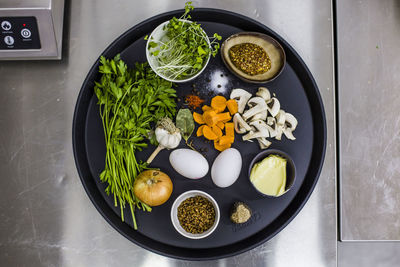 High angle view of chopped vegetables in bowl on table