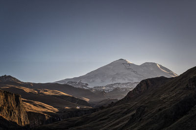 Scenic view of mountains against clear sky