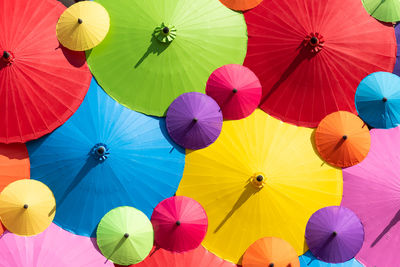 Low angle view of multi colored umbrellas