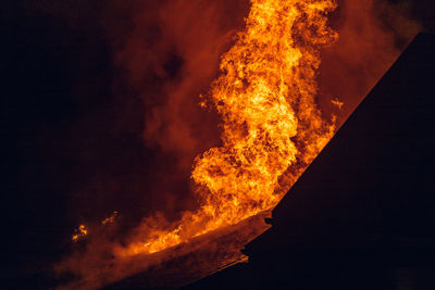 High angle view of bonfire at night