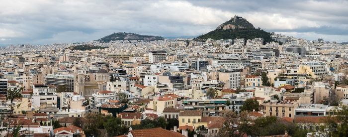 Aerial view of townscape against sky