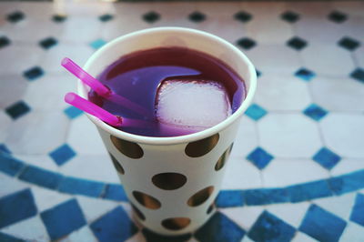 Close-up of coffee cup on table